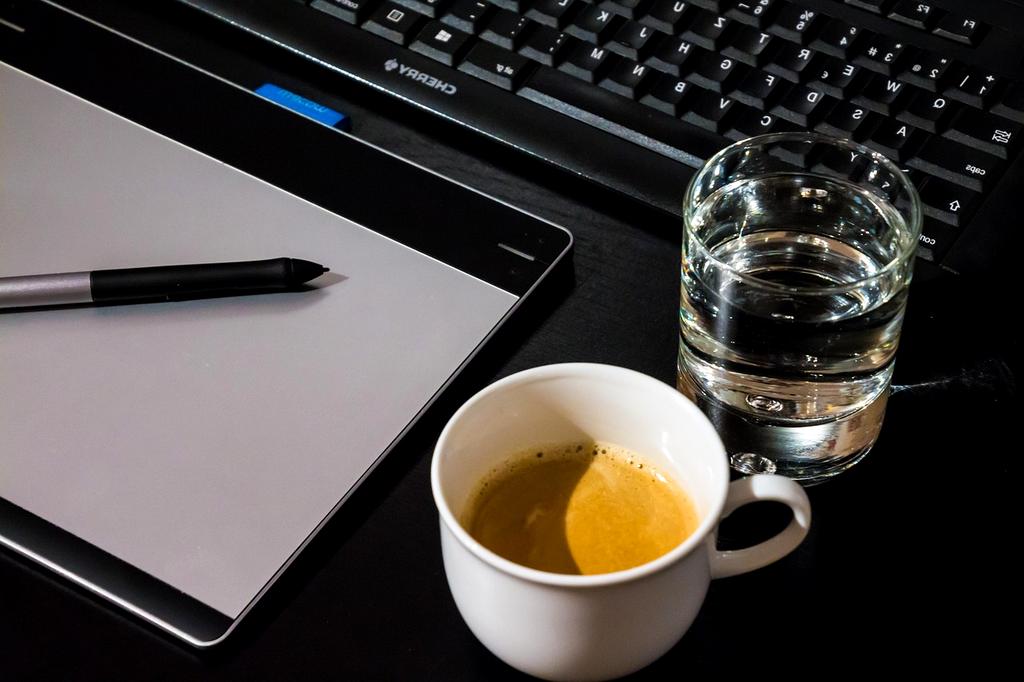 Quantum tablet with holographic interface displaying molecular simulations